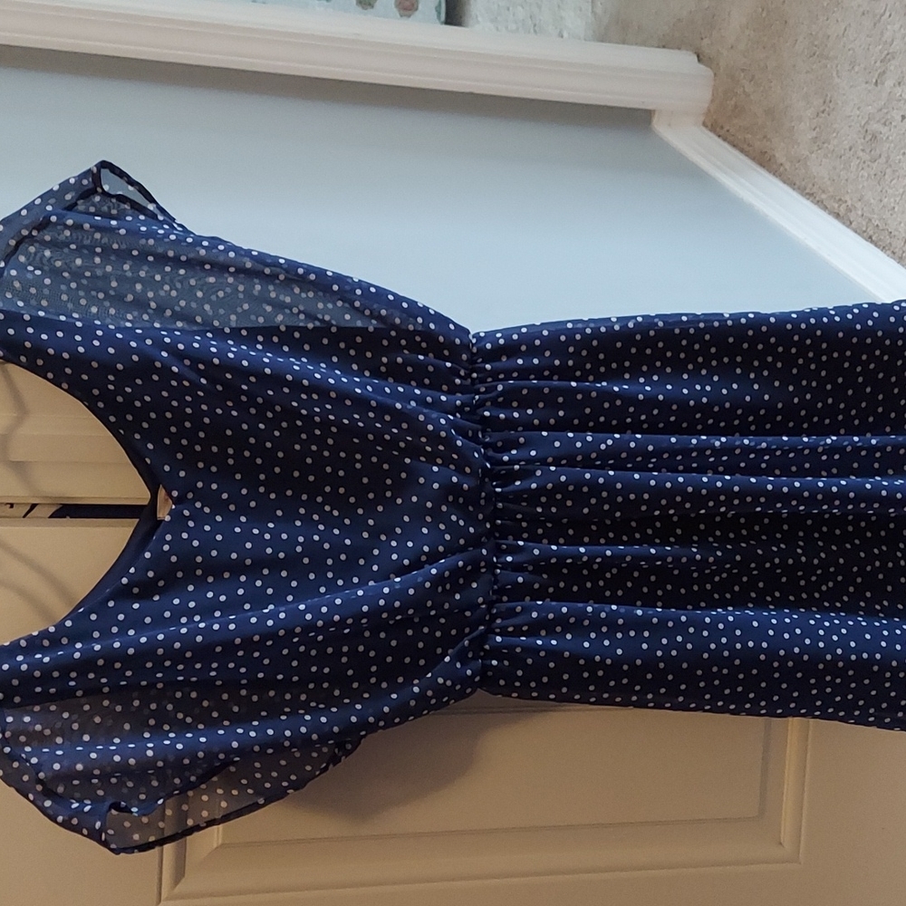 Small navy blue slip tank dress with white polka dots